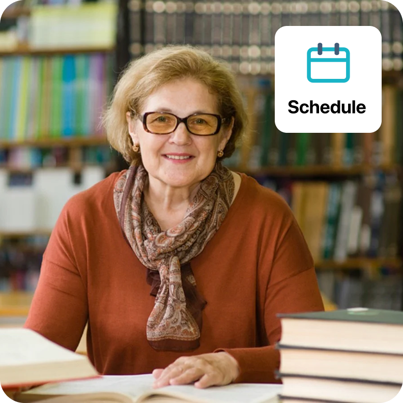 Image of smiling librarian looking to camera